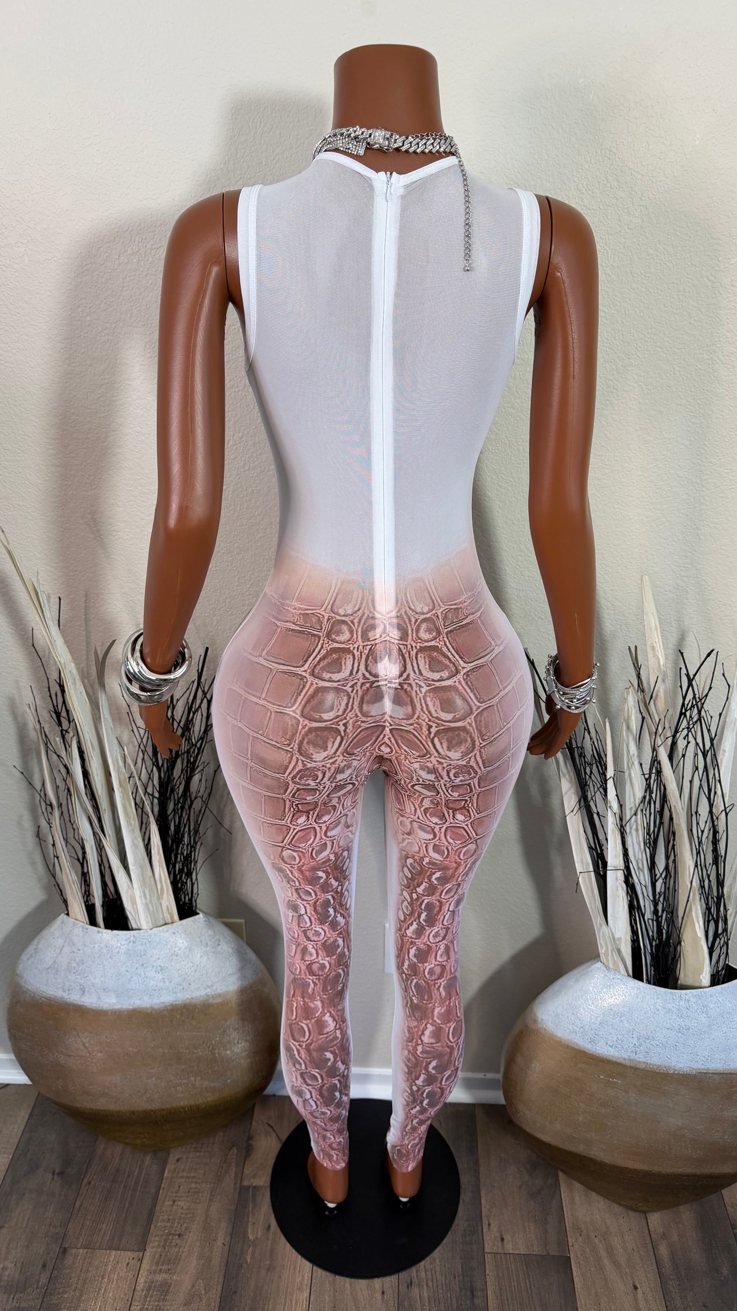 THE SIGNATURE JUMPSUIT