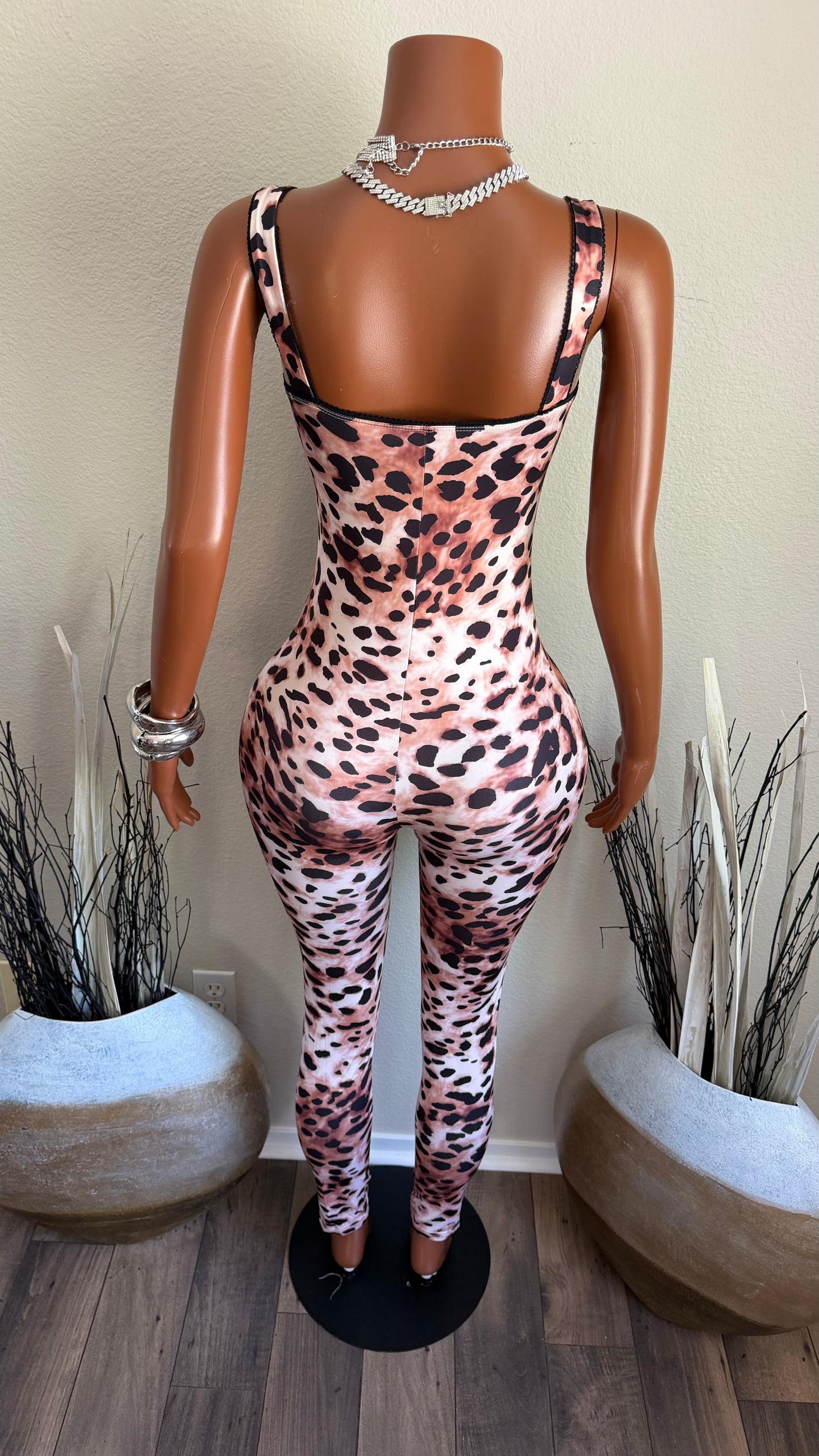 WILDLY BOOKED JUMPSUIT